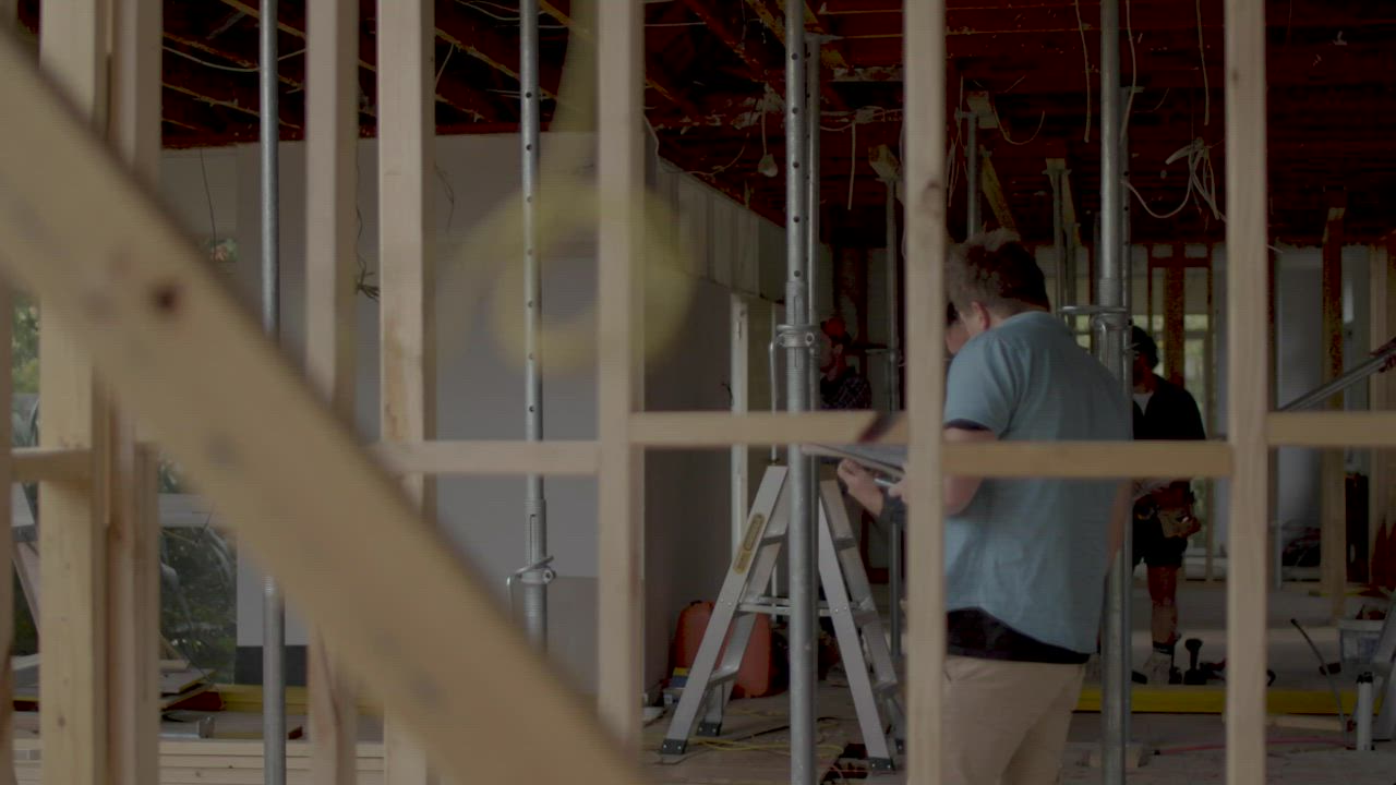 Trade technician working inside a mechanical space